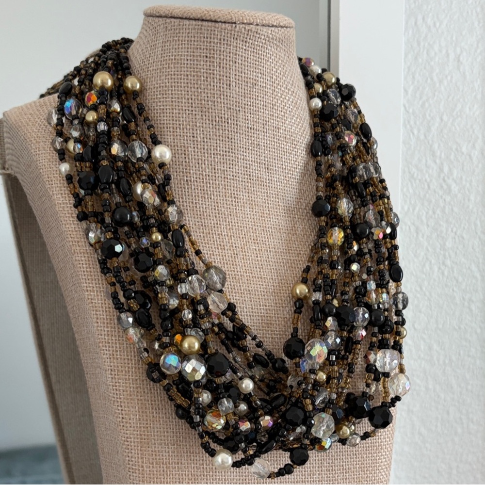Joan Rivers Classics.     Multistrand Black and Gold Necklace